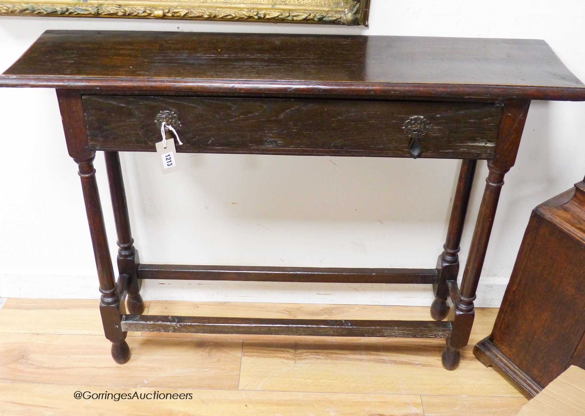 A narrow oak rectangular side table